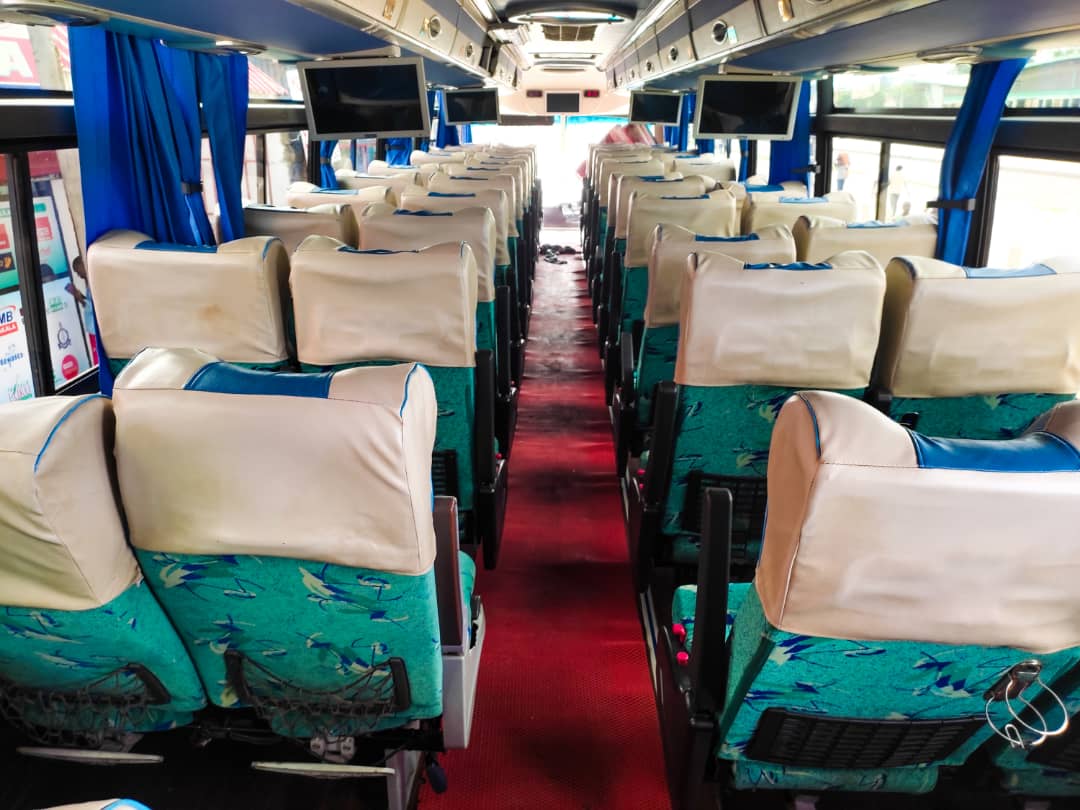 Aifola Express bus interior showing comfortable seating